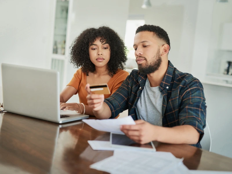 An image showing a family with too many credit card accounts