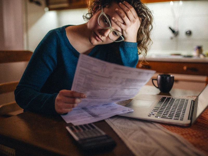 Image showing a South Florida small business debtor in distress, looking through financial affairs, and deciding between Chapter 7 and Chapter 11 bankruptcy.