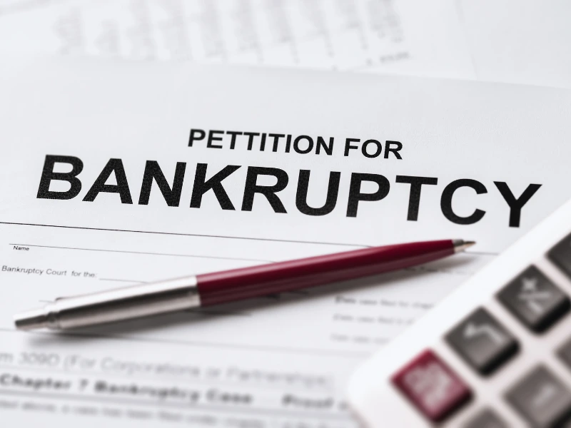 Image shows a petition for bankruptcy form to manage debt for an individual considering personal bankruptcy.